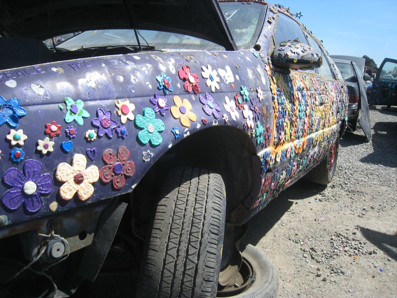 Illustration for article titled Groovalicious Purple Princess Of Peace Art Car Falls On Hard Times, Faces Crusher